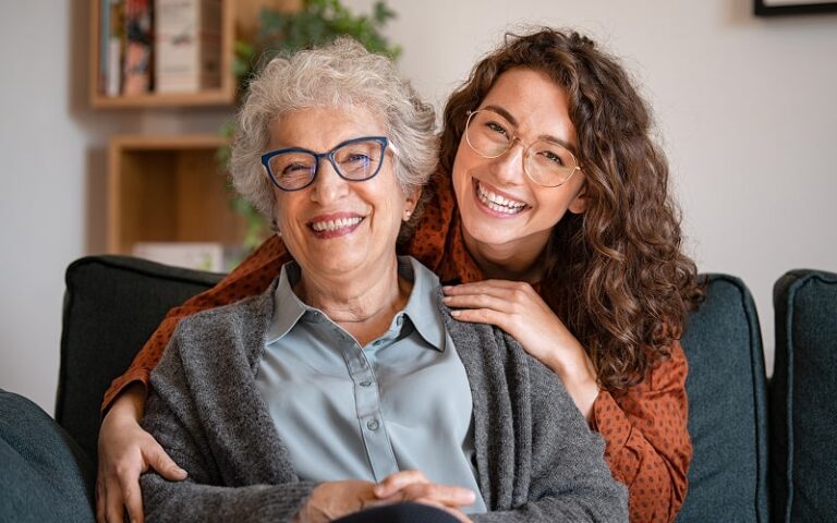 Two women are smiling